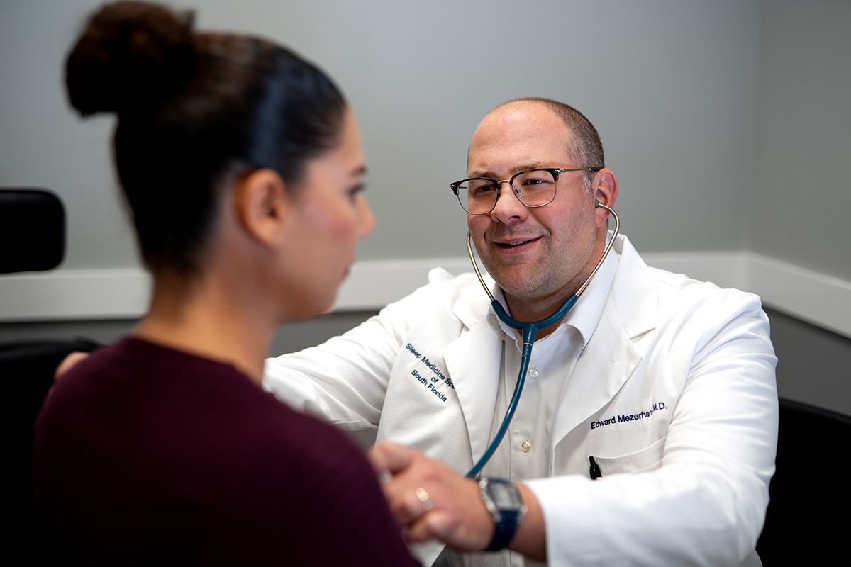 Doctor consulting with patient